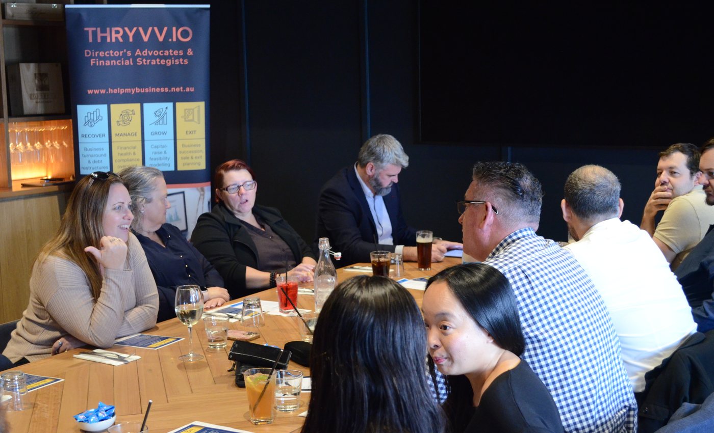MBP members and guests seated around a professional gathering table